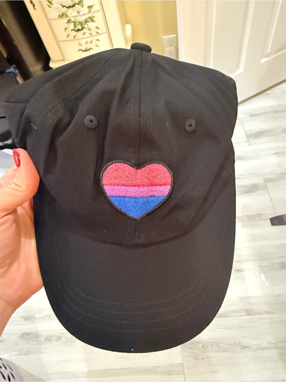 Black Baseball Cap with Pink and Blue Heart Patch